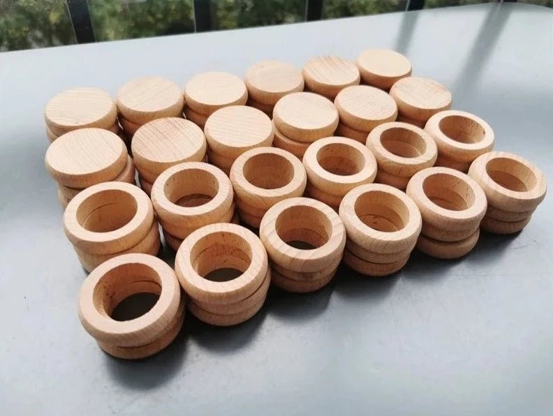 Montessori Rainbow Stacking Coins and Rings with Peg Dolls, showcasing a collection of stackable wooden rings and coins designed for developing fine motor skills and imaginative play.