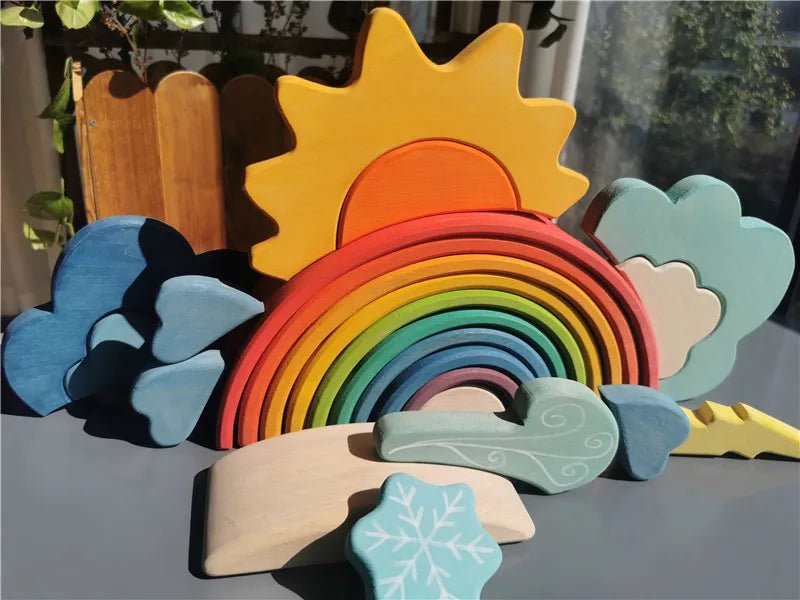 Montessori Rainbow Weather Stacker & Blocks Set featuring a wooden rainbow and cloud blocks, designed for educational play and enhancing creativity in children.