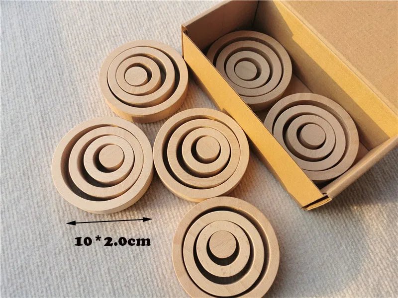 Montessori Rainbow Wooden Nesting Rings: Stacking Blocks in a box, featuring circular, colorful beech wood rings designed for creative, open-ended play and skill development.