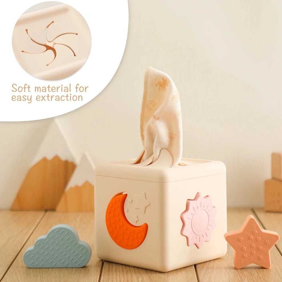 Montessori Silicone Tissue Box with interactive shapes fits into slots, promoting cognitive skills and sensory development for children.