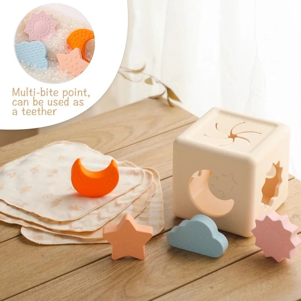 Montessori Silicone Tissue Box with interactive shape cutouts for cognitive and sensory development, ideal for promoting independent play among young children.