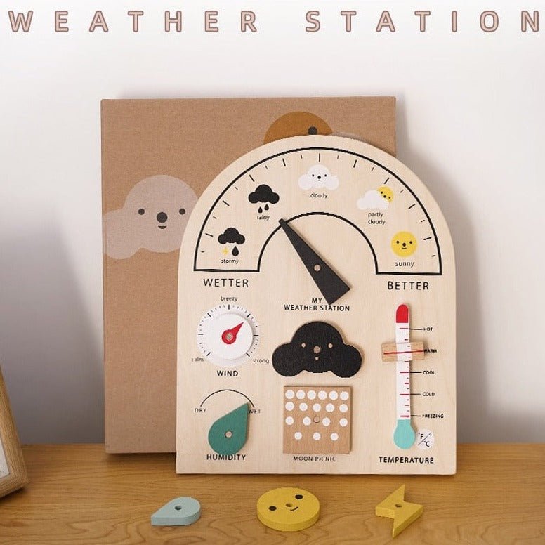 Montessori Weather Station made of beech wood with interactive dials and sliders for children to explore weather forecasting, fostering curiosity and learning through play.