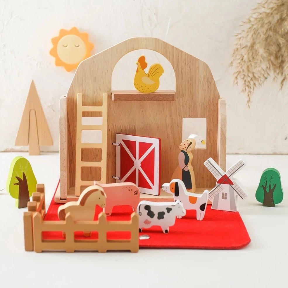 Montessori Wooden Farmhouse Toy Set featuring a barn, animals, and a windmill, designed to foster imagination and enhance motor skills.