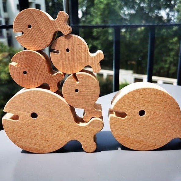 Montessori Wooden Fish Set featuring intricately crafted wooden fish, ideal for imaginative play and storytelling, made from natural basswood for safe, sensory-rich playtime.