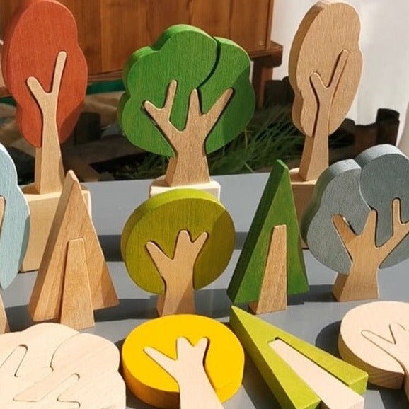 Montessori Wooden Forest Tree Puzzles featuring wooden saplings as simple 2-3 piece puzzles, crafted from durable beech wood, designed for children's problem-solving and imaginative play.