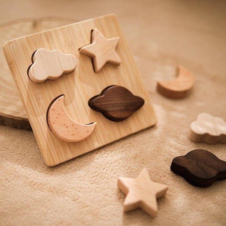 Montessori Wooden Moon and Stars Puzzle made from beech wood, featuring various shapes for toddlers' educational play and skill development, crafted by Oliver & Company Montessori Toys.
