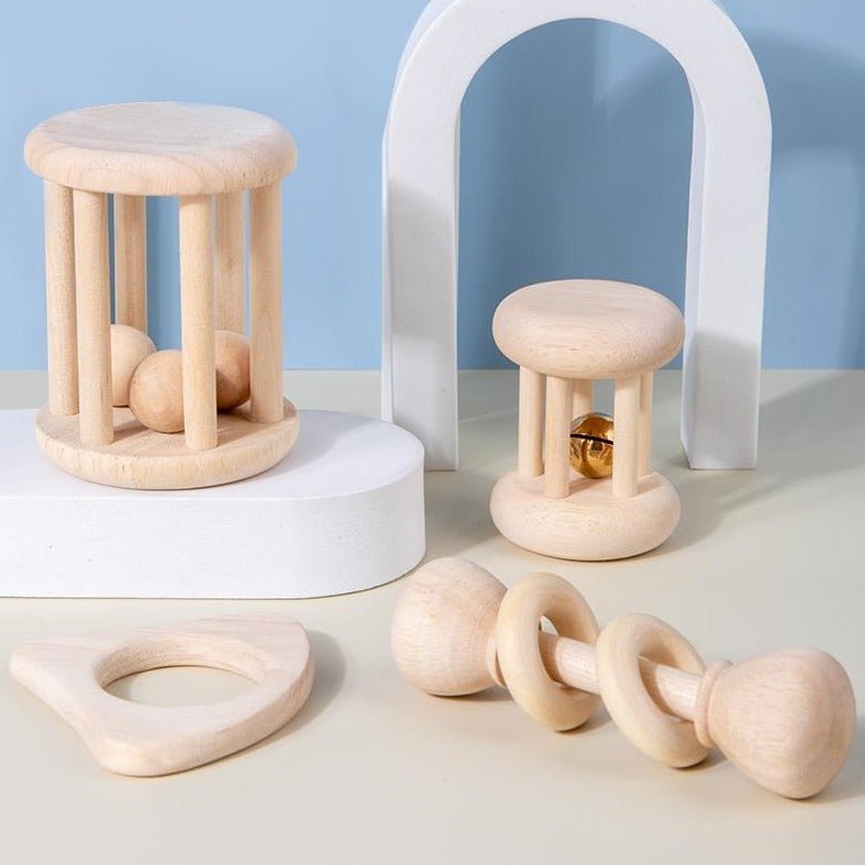 Montessori Wooden Rattle Toys crafted from beech wood, featuring unique shapes and engaging designs to support early cognitive development and sensory exploration for babies.