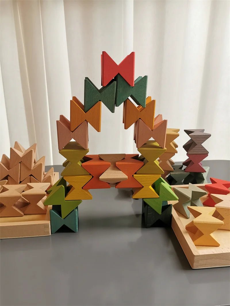 Montessori Wooden Stacking Butterfly Blocks on a table, featuring hand-carved hardwood pieces designed for educational play and skill development in children.