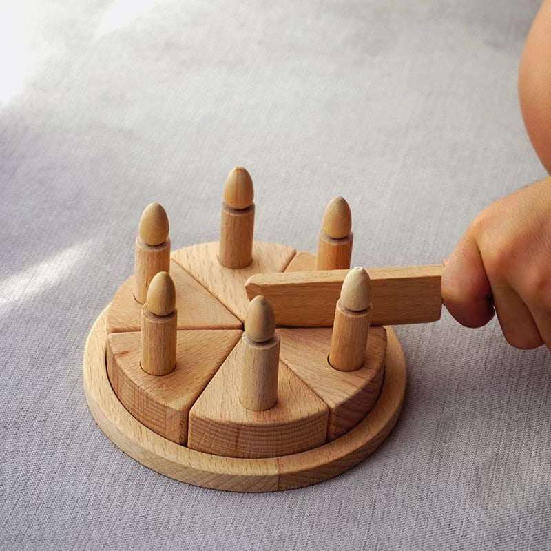 Hand holding a wooden Montessori puzzle piece from the Montessori Wooden Toys: Sorting Cups, Popsicles, Waffles, Cake, Magnifier collection, emphasizing educational play.