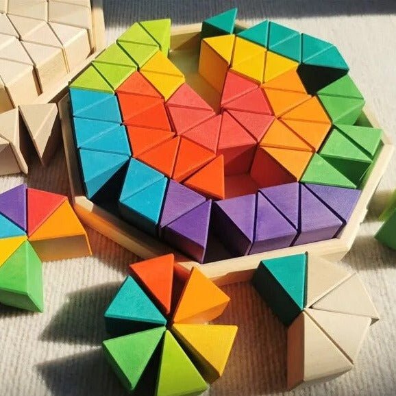 Montessori Wooden Triangle Building Blocks arranged creatively, showcasing their potential for educational, imaginative play and learning through stacking and balancing.