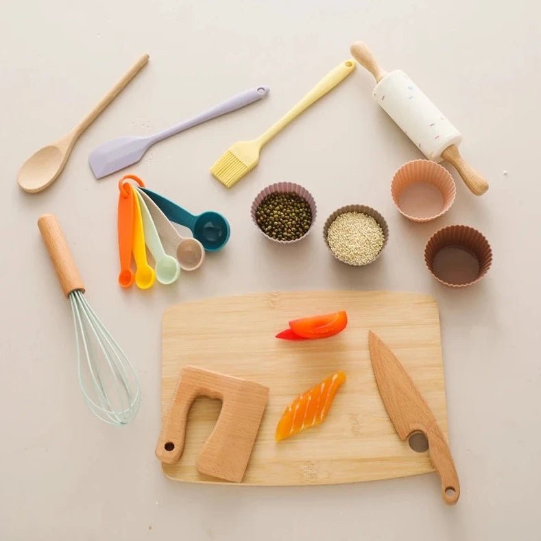 Wooden and Silicone Kitchenware Sets for Kids featuring a cutting board, rolling pin, whisk, and various utensils designed for imaginative, educational play.
